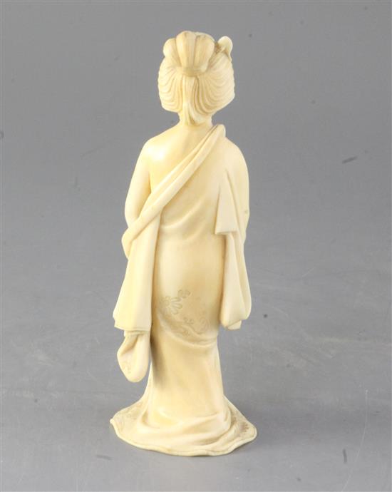 A Japanese ivory erotic figure of a bijin, early 20th century, height 18cm